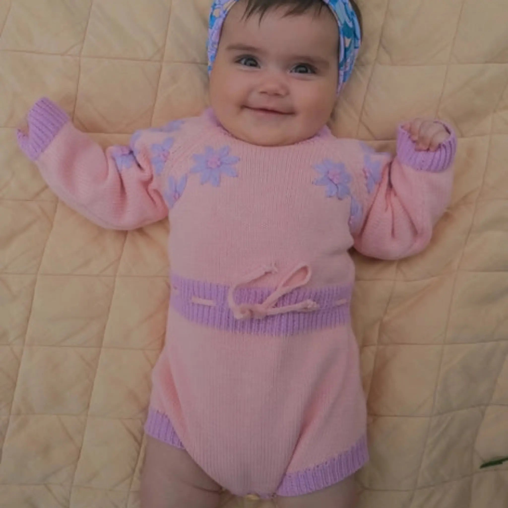  Knitted Pink Baby Romper with Lilac Embroidered Flowers